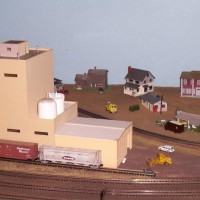 The City of Seneca was even fortunate enough to become the site of G.U.A.N.O. Corporation's (Greater Utilization of All Natural Organics) advanced waste utilization plant. One of the facility's main structures is partially visible in this view.