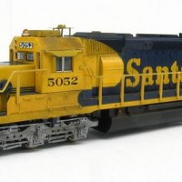 ATSF SD40-2 #5052

This was the first loco I detailed, so it's a little rough due to my inexperience. It also fell off the layout 6 months later, which didn't help it's roughness. 
It started life as a snoot nose and was modified to fit a regular nose. After rebuilding it from the fall, I added an anticlimber and airlines to the air cylinders.