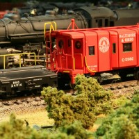 B&O Scale Car X4914 wags along at the rear of a freight train, Norton, WV