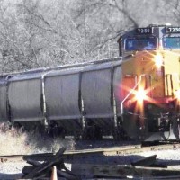 UP 7250 and 8322(not pictured) bring the Iowa Northern "Corn" train around the bend passing under the US Hwy 30 overpass at Beverly, IA--March 4, 2009.