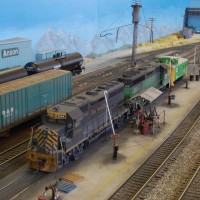 Branch power and caboose at Anson MPD.  The locomotives have been serviced, and await the call from the Yard Master to take the return train back up the branch line.  The caboose is required for reversing moves along the way.