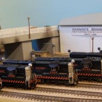 A line-up of six of my ten SP SD7's, in three different liveries - Tiger-Stripe, Black Widow, and a prototypical "in-between" one as seen on 5318 on the left.  All have a Loksound 3.5 installed, and a custom sound download which accurately captures the early EMD "transition" sound.