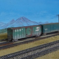 2 boxcars in Anson Yard, awaiting collection by the next westbound freight.  21 Feb 09.