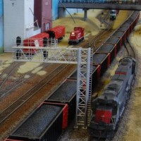 Helpers await coal train.  Note that the CP switcher remains in one of the elevator sidings, due to the impending departure of a train from Anson Yard.   21 Mar 2009.