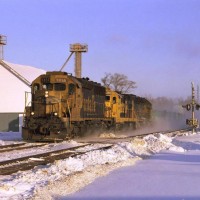ATSF SD45 2 5856 and two more Santa Fe units hustle an east bound through Stoddard WI.