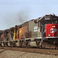 SD45T 2 9391 leads an east bound double stack through Kansas City