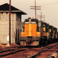CNW 4126 heads for Winona MN past the Grand Crossing Interlocking Tower in La Crosse WI