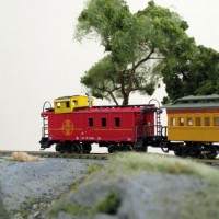 One of my first N scale items, Bachmann ATSF Caboose sporting it's new brass ladders and chimney.