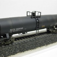 Updated photo of same tank car but with body mounted MT Z scale #905 couplers fitted - note the difference