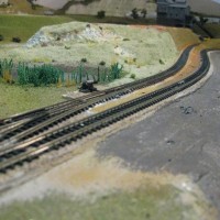 After scenery added to the hill and pond, before ballast.