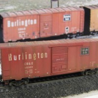 Weathered MTL CB&Q 40ft Boxcar. I oversprayed this car with a diluted mix of Reefer Orange / Reefer White to "fade" the "Burlington Chinese Red" to match the proto pic I used as a reference