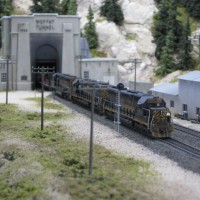 A pair of SD45's + a single geep head out of East Portal
