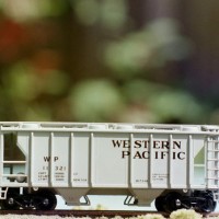 Atlas Western Pacific covered hopper #11321 used in cement and limestone service.