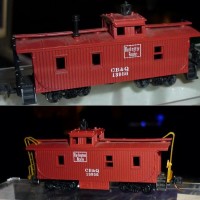 This is an old Roco/Con Cor caboose. top picture is original. The bottom picture is just 5 minutes tinkering. I put it on an MTL dorky "Pepsi" caboose. It fits perfectly, with very little mod. All I had to do was cut off the tabs that held it on the original chassis, and trim the edges to match the steps,and walla.. Now all that needs to be done is a little work on the ladders, paint and detail.