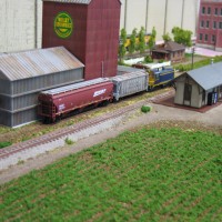 farm_2 -- Row crops, grain elevator, and station. The foam was garved down about 1/4" so the siding track would be lower than the mainline.