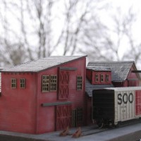 On a cold, gray February morning, a lone box car sits outside the fish house waiting for a load.  It's early on Sunday, and nothing's moving but the wharf rats, some as big as cats!