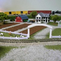 Updated farm scene. I guess I couldn't leave well enough alone. So I added the front gate and some gravel in front of my greenhouse.