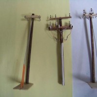 "23kv" deadend, delta riser pole and 2 way deadend poles.