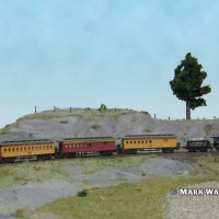 My Ultimate 4-4-0 lettered TBC 10, celebrating 10 years of TrainBoard.com, pulls UP 9, CP 8, UP 7, and ATSF 999628.