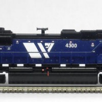 Kato SD70ACe MRL 4300.  Used Model Masters acryl "Blue Angel Blue". Used Trainworx SD70ACe/M-2 detail set and BLMA grab irons.  Moved Headlight to the nose, shaved off number board backing to make more correct, removed smaller GPS dome and lowered rear headlight.  Rear of underframe was milled to make rear grills see-through.