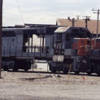 A closer look at an SD45 in storage behind SP's backshop area. She looks like she has a bent frame.