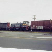 A pair of former SP rest in Escalon, Ca on the old Tidewater Southern. I guess the crew was grabbing lunch.