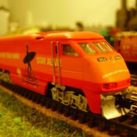 Amtrak F59PHI Lifesaver: a completely repainted Athearn shell decaled with custom decals.
