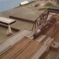 Scratchbuilt Galveston Causeway Bridge. The tow boat and barge are also scratchbuilt.