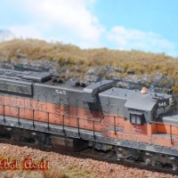 These are my first attempts at kitbashing SD10s since I got back into model railroading last August. The SD10s are my favorite locomotive of all time, so there will be more added to the roster in the future. 

These are modeled to represent how they would have appeared in 1979-1980 time frame.

I painted these units with custom mixed acrylic craft paints. They were weathered with a variety of mediums and techniques.