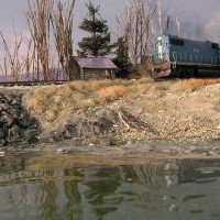 Boston and Maine GP38-2 running light past the derelict shack.