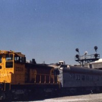 A Kodachrome SP SW1500 switches an passenger car. I can't remember if the car was privately owned or a business car.