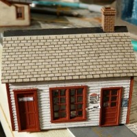 Norm's Gasoline & Oil, by Railroadkits.com.  This is the main building, in progress of the roofing.