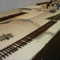 Test fitting track over river, note the closer ties for the bridge section.