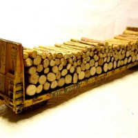 Athearn TTX 60' Bulhead Flatcar, loaded with real wood and weathered.
