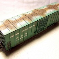Atlas PC 50' ACF Precision Design Boxcar, weathered.