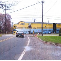 SB Rail Lines F-3 units at a crossing

Fake