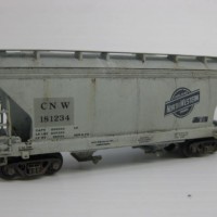An IMRC CNW 2 bay Hopper that I had duplicate road nos. of so I did a "patch job" using a different font to the cars original lettering 
The car got an overspray of Floquil Dust & a few washes & light rust streaks