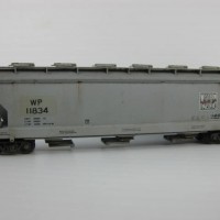 Micro Trains WP 3 bay Hopper that also got a "patch job" just for the heck of it - I tried to make the new road no. a little off so it looked like a hurried job. Used Block Gothic font rather than the original RR Roman. 
Light weathering followed
