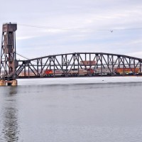 BNSF engines over lift bridge. The bridge is owned by NS and used by CSX, actually more than NS.