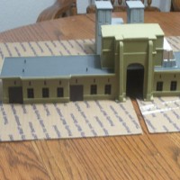 2 days of painting & here is what it is looking like from the front. Still more to paint but it is half way done.