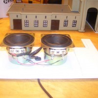 Ready for sound! I just installed 2 speakers to fit snugly under the roof of the Moffat you see here. My plan is to record an exaust fan sound for about 2 minutes, burn the sound onto a CD. Then it can play on a small CD player. My Moffat will then have sound.