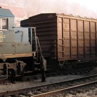 Boston and Maine GP38-2 with a waffle-sided boxcar
