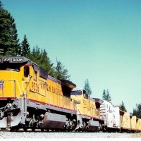 Helpers push hard on this westbound manifest at Motanic on the La Grande sub