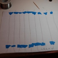 After soldering up the LEDs, I array them, by color, on a sheet of paper.
