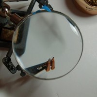 Cool little tool, under magnifying glass, to hold wires and LEDs
