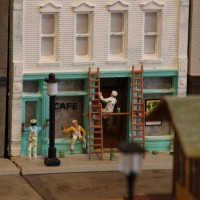 Painters working on old cafe