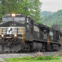 Ns 9674 leads 3 Dash-9s on a coal train.