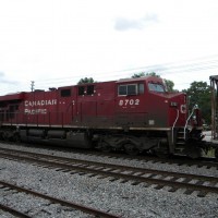 CSX Train K820 has CP 8702 (AC4400) Trailing as the 3rd engine on the train. Lakeland, FL 2012