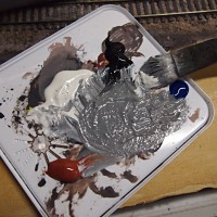 warm white, charcoal, blue, burnt sienna