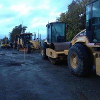 A line of heavy equipment waiting to rework the right of way in Petaluma, Ca.